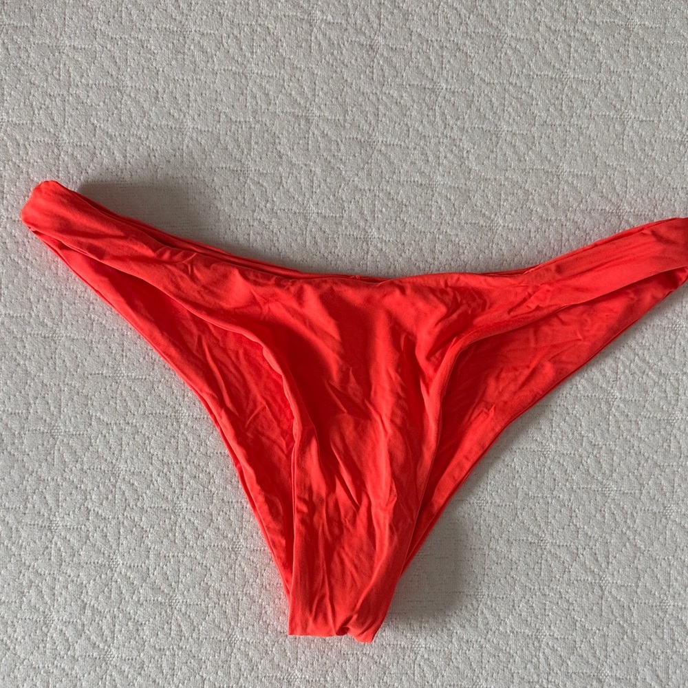 Dippin' Daisy's Vibrant Orange Bikini Bottom